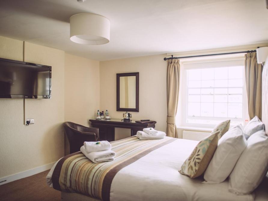 The George Hotell West Bay Rum bild